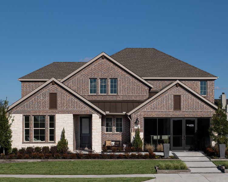Front exterior of a home in the View at the Reserve 60s community, located in Mansfield, TX (Image 9).