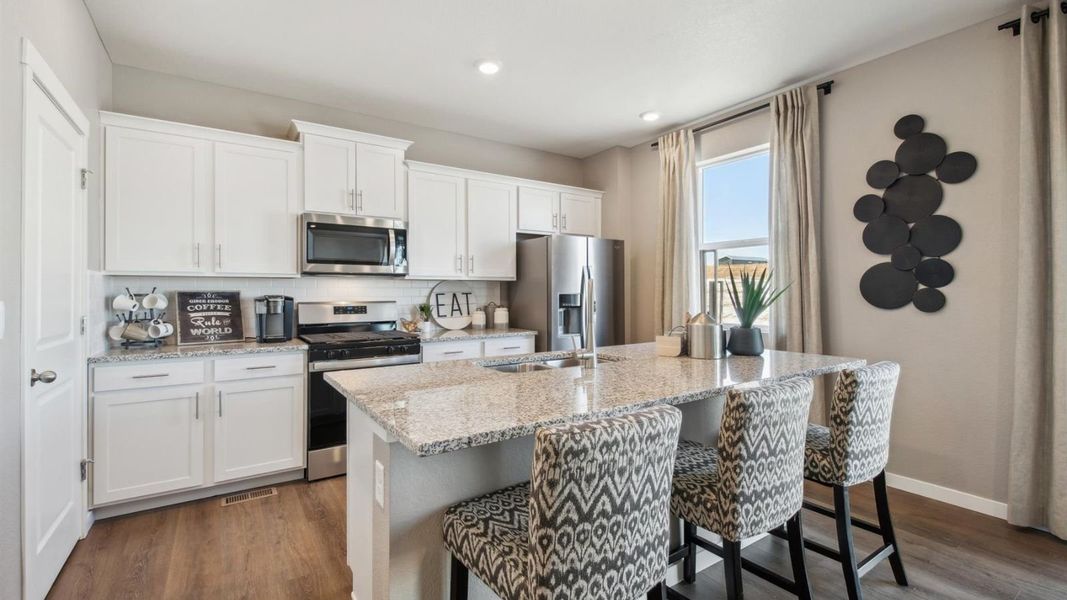 Furnished interior in a model home at Spring Valley Ranch in Elizabeth (Image 6).
