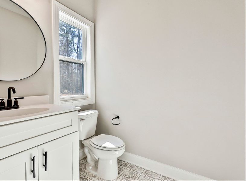 Furnished interior in a model home at Welch Farms in Senoia (Image 5).