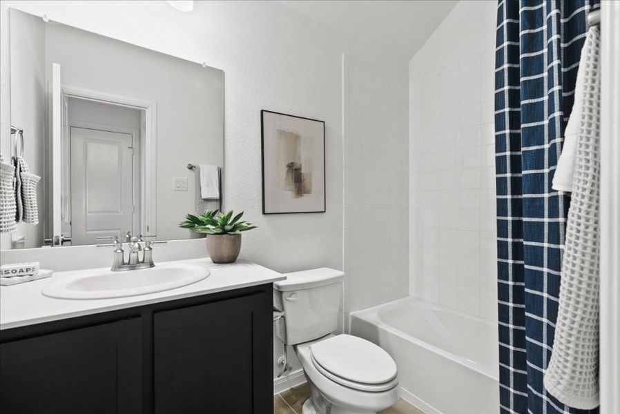 Furnished interior in a model home at Creekview Meadows in Pilot Point (Image 29).