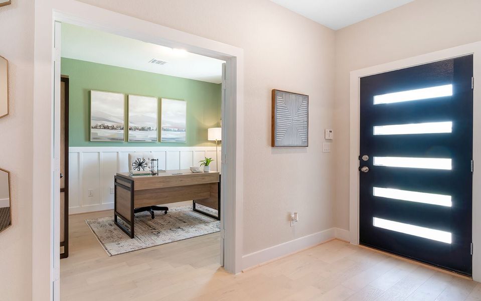 Furnished interior in a model home at Grande Estates in Bertram (Image 4).