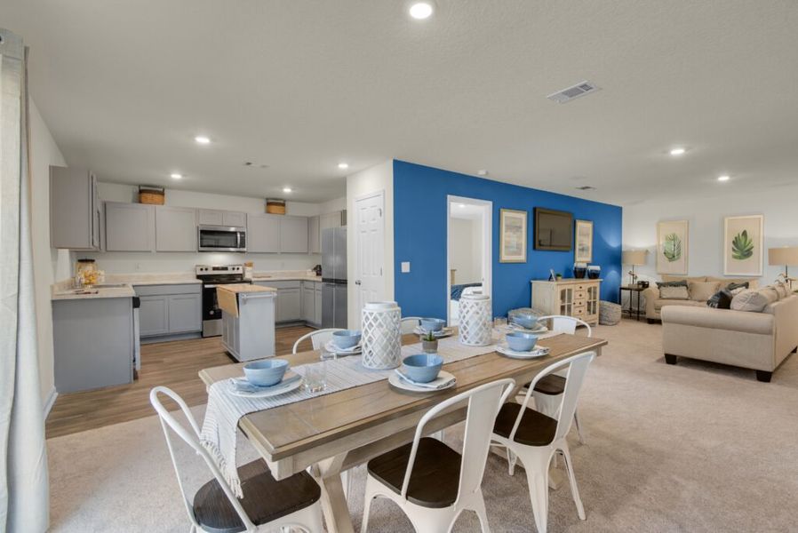 Furnished interior in a model home at Floridatown in Pace (Image 3).