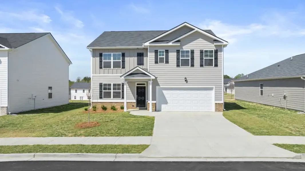 Front exterior of a home in the Stillwater Lake Oconee community, located in Eatonton, GA (Image 11).