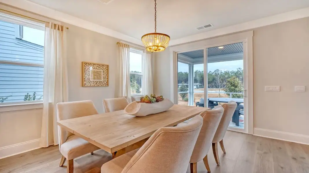 Furnished interior in a model home at Wappetaw Woods in Awendaw (Image 4).