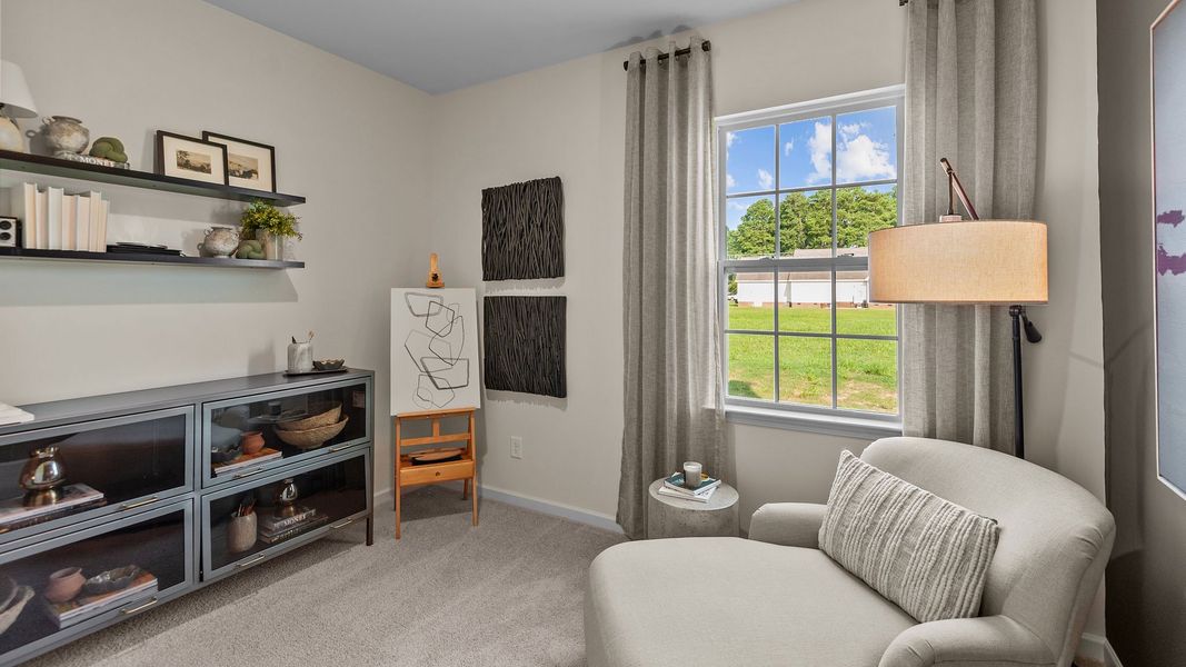 Furnished interior in a model home at The Preserve at Kinsley in Jamestown (Image 13).