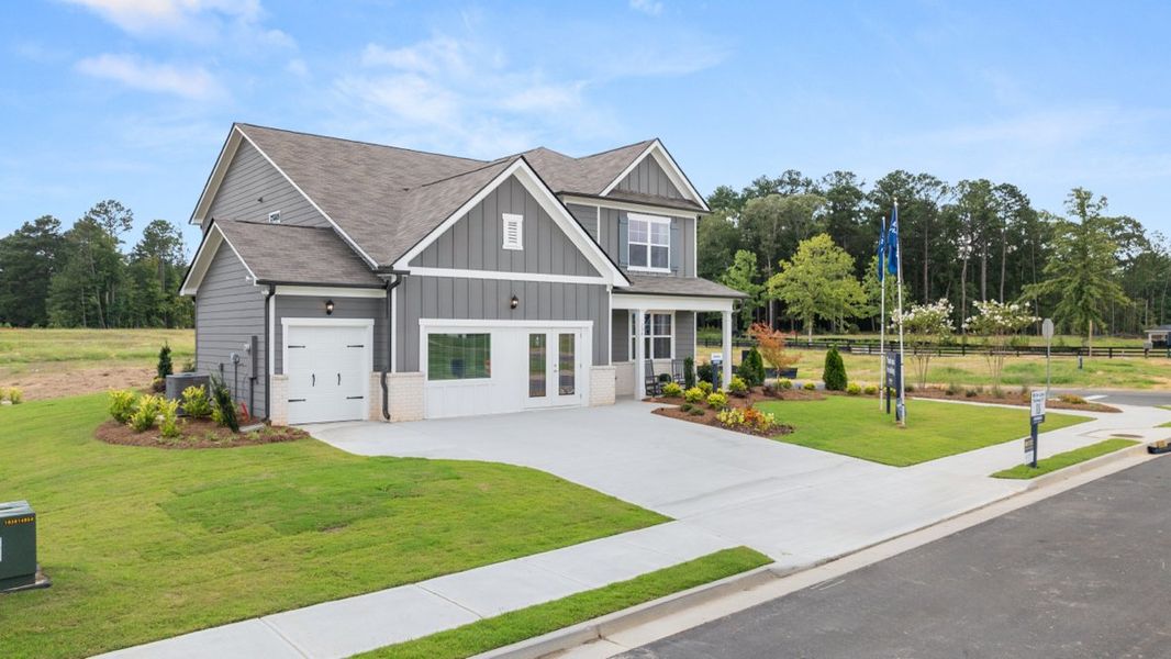 Front exterior of a home in the Fairway 17 at Mirror Lake community, located in Villa Rica, GA (Image 12).