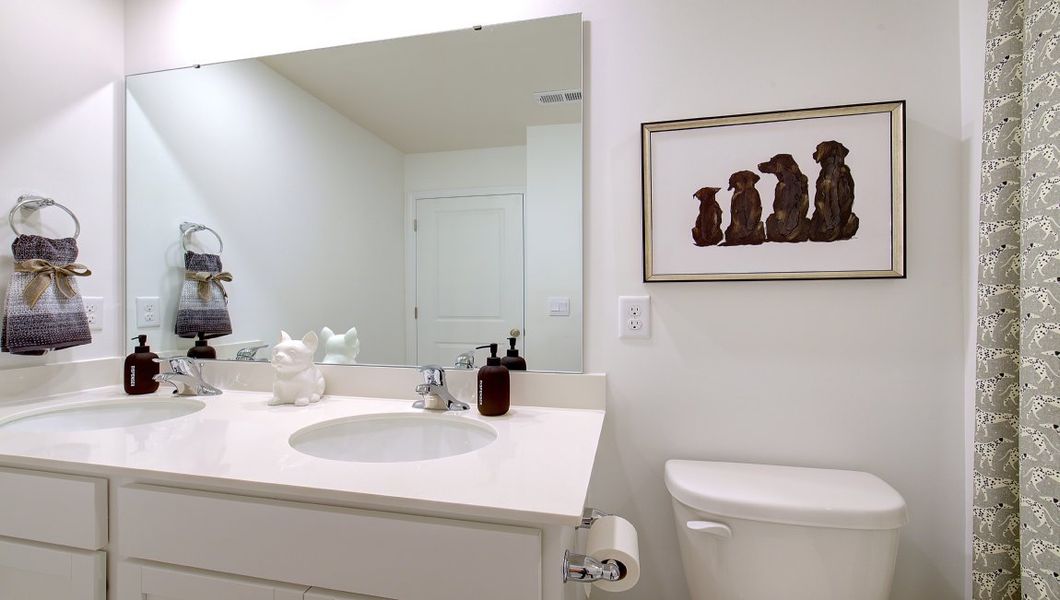 Furnished interior in a model home at Heritage Park in Fletcher (Image 31).