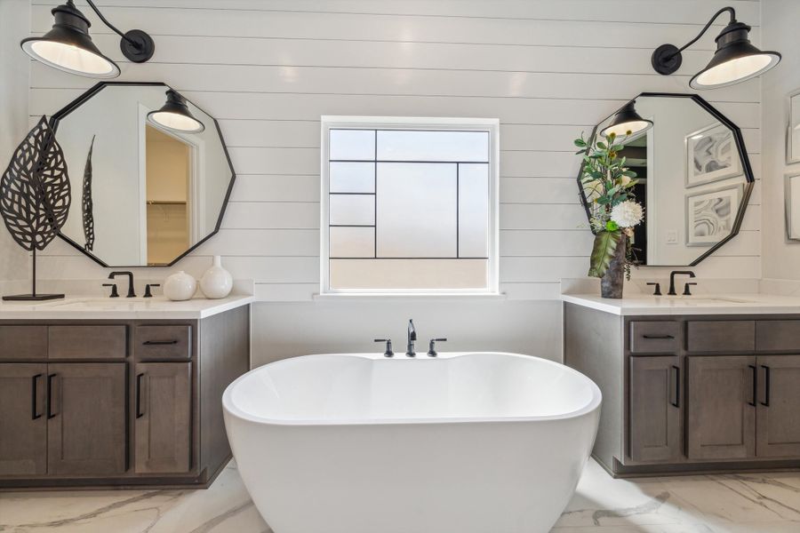 Furnished interior in a model home at The Woodlands Hills – 65' in Willis (Image 18).