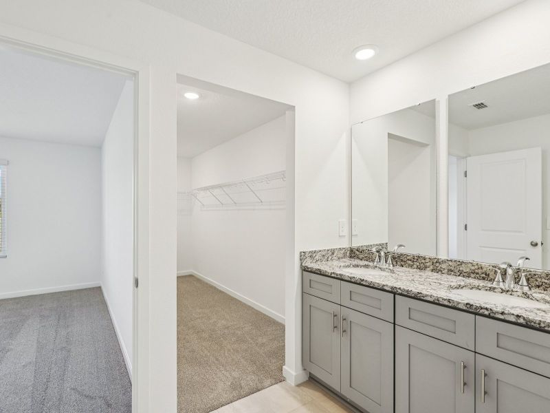 Furnished interior in a model home at Lakes at Bella Lago - Premier Series in Green Cove Springs (Image 6).