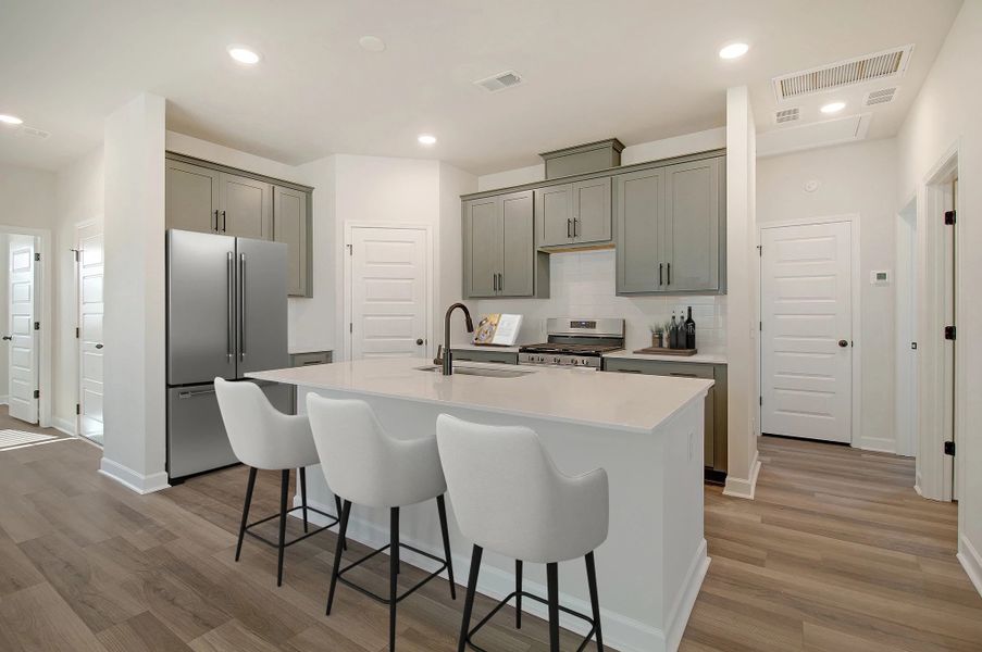 Furnished interior in a model home at Tea Farm: Lake Series in Ravenel (Image 11).