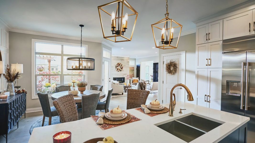 Furnished interior in a model home at The Courtyards at Hodges Farm in Charlotte (Image 17).