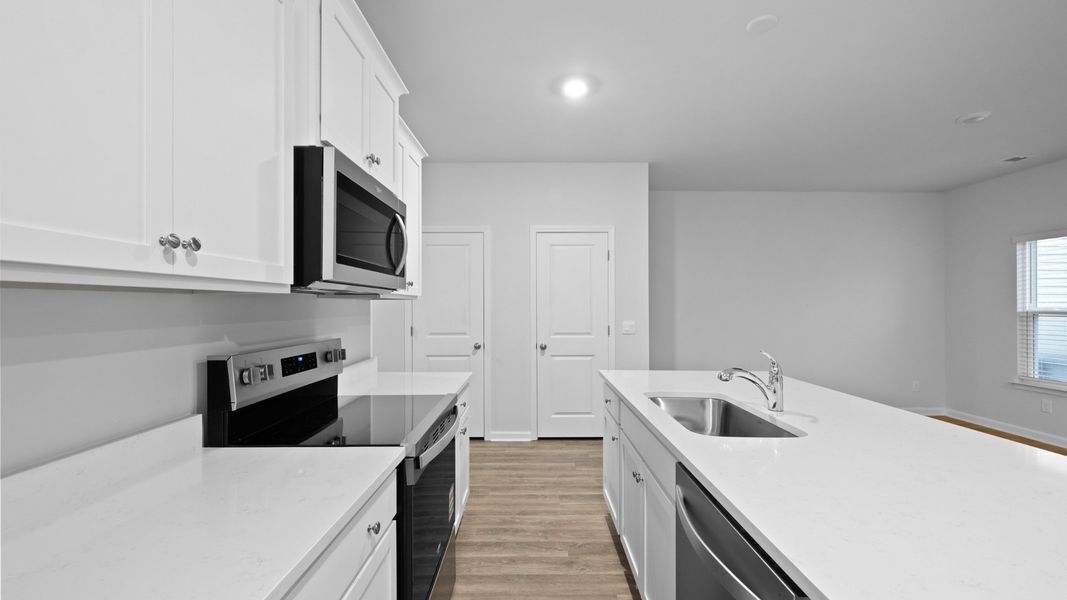 Furnished interior in a model home at Garbon Fields in Summerville (Image 13).