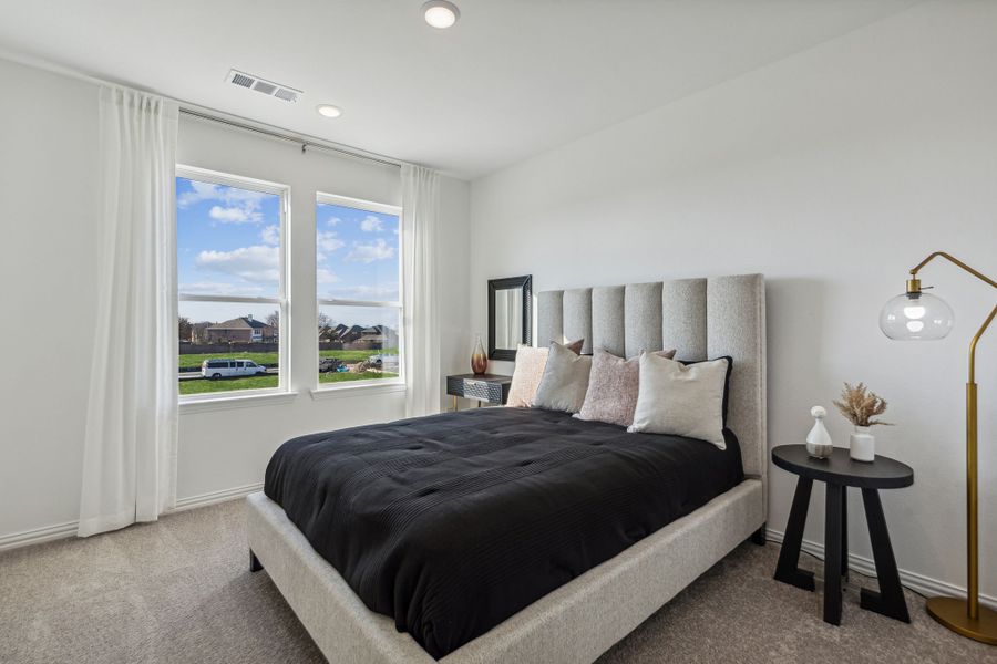 Furnished interior in a model home at Village on Main Street in Frisco (Image 38).