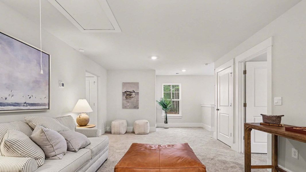 Furnished interior in a model home at Chapman Village in Conway (Image 7).