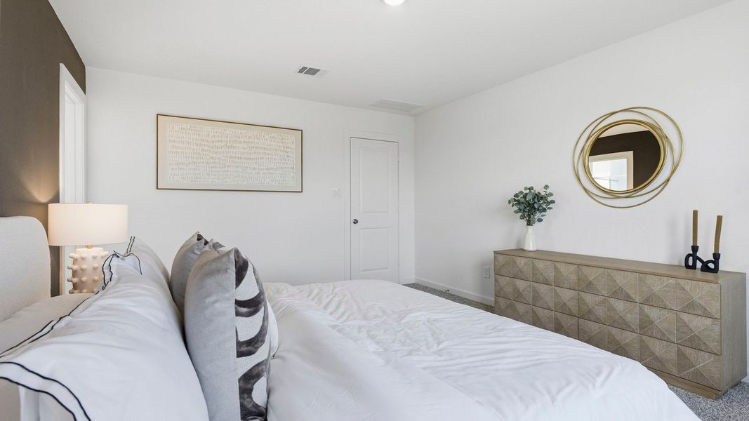 Furnished interior in a model home at Murphy Village in Missouri City (Image 19).