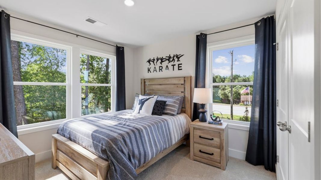 Furnished interior in a model home at Ken's Crossing in Moore (Image 26).