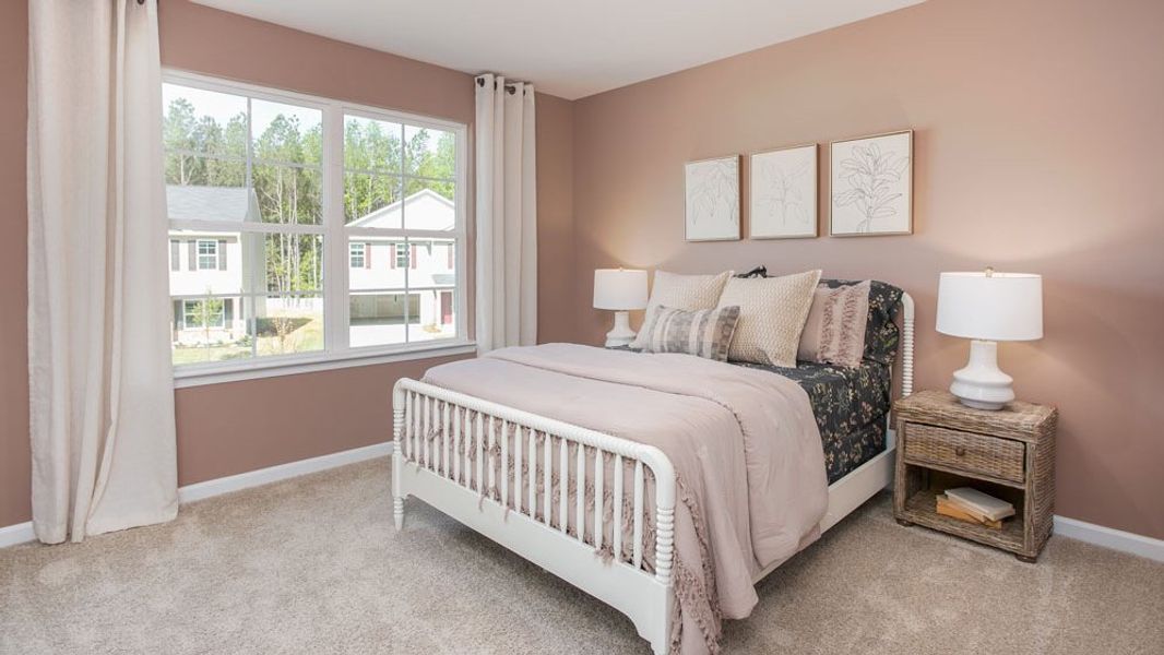 Furnished interior in a model home at River's Edge in Mayodan (Image 18).