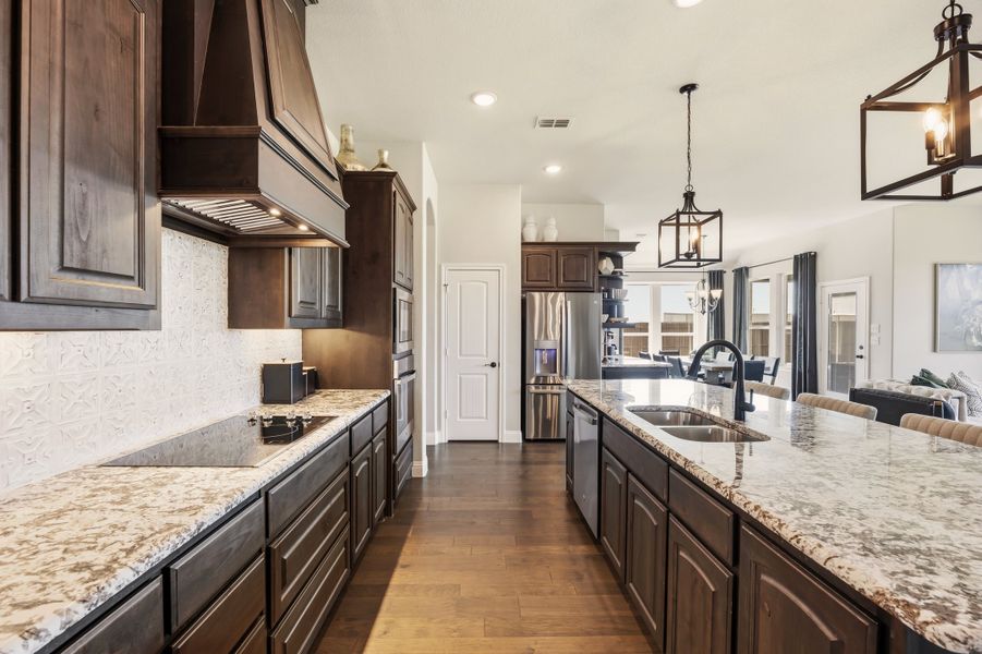 Furnished interior in a model home at Coyote Crossing in Godley (Image 10).