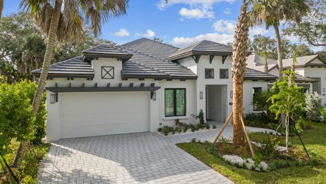 Front exterior of a home in the Seaglass community, located in Vero Beach, FL (Image 62).