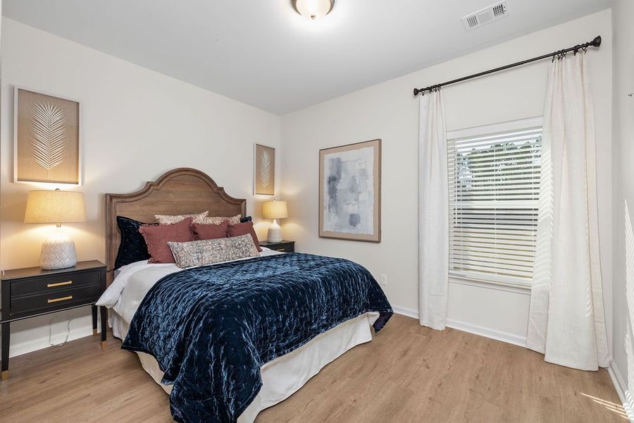 Furnished interior in a model home at Belair East in Statesboro (Image 13).
