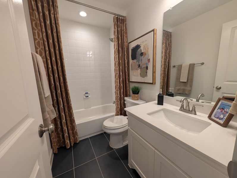 Furnished interior in a model home at Landmark in Denton (Image 29).