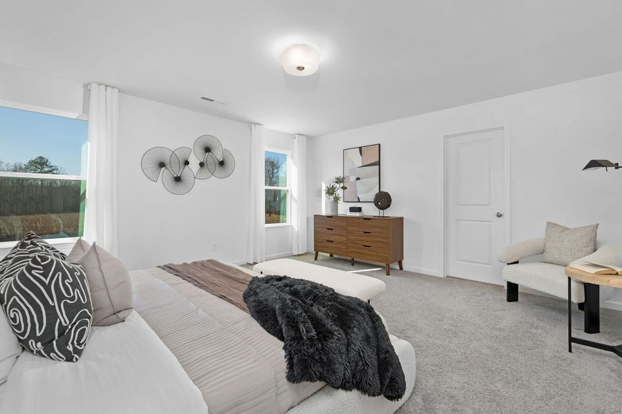 Furnished interior in a model home at Whispering Hills in Locust (Image 11).