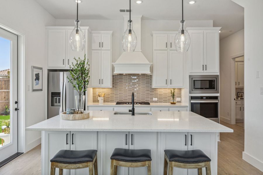 Furnished interior in a model home at Newman Village Townhomes in Frisco (Image 22).