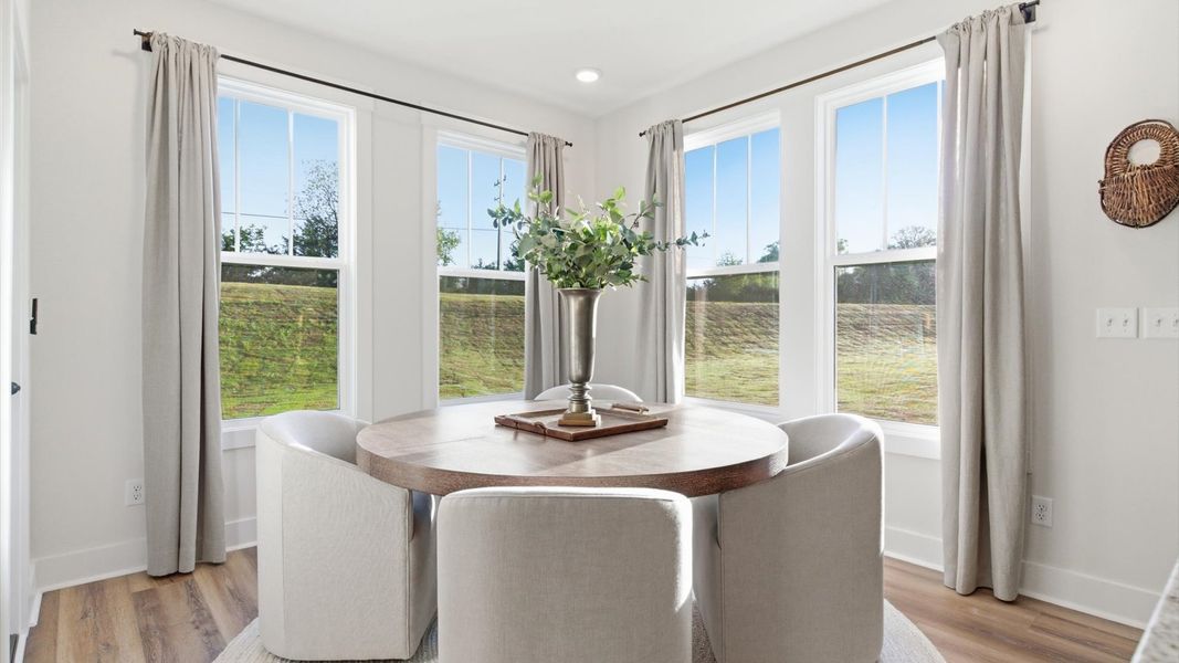 Furnished interior in a model home at Benjamin's Grove in Woodruff (Image 25).