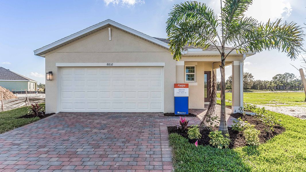 Front exterior of a home in the Belle Arbor community, located in Labelle, FL (Image 9).