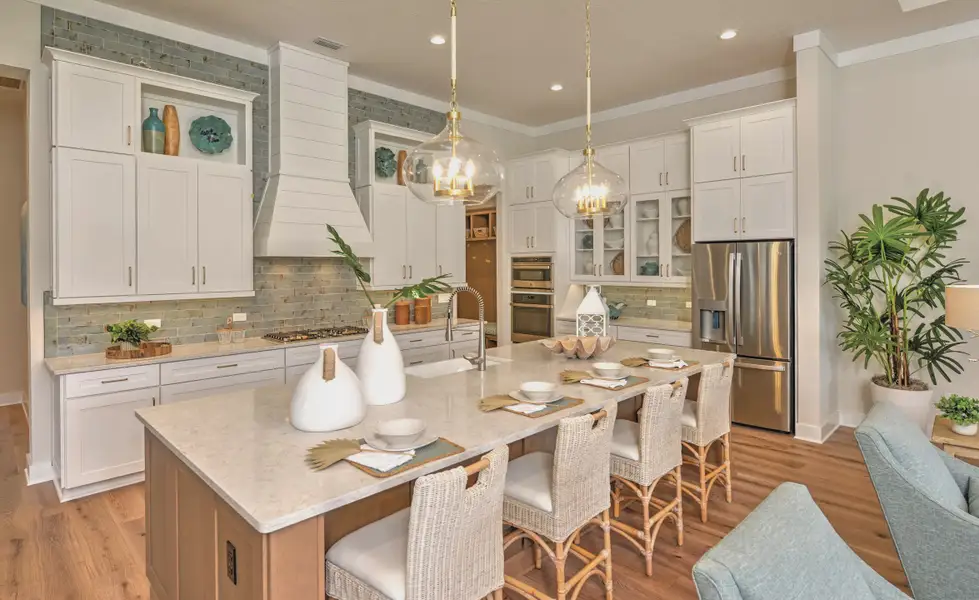 Furnished interior in a model home at Amelia National in Fernandina Beach (Image 4).