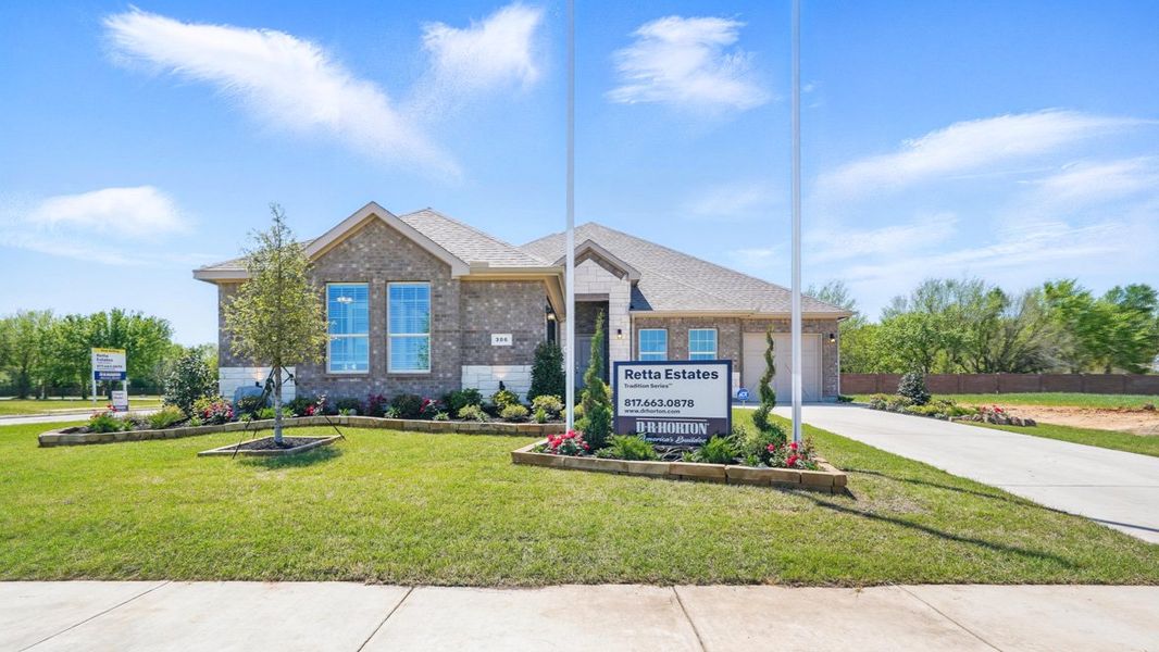 Front exterior of a home in the Retta Estates community, located in Mansfield, TX (Image 2).