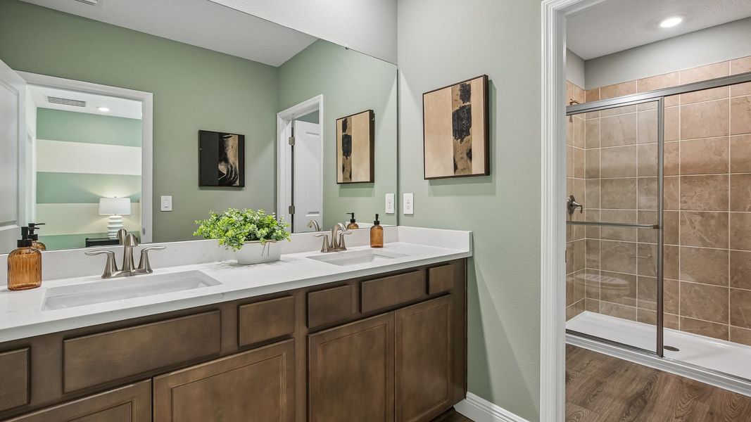Furnished interior in a model home at Sanctuary at Citrus Park Townhomes in Tampa (Image 18).