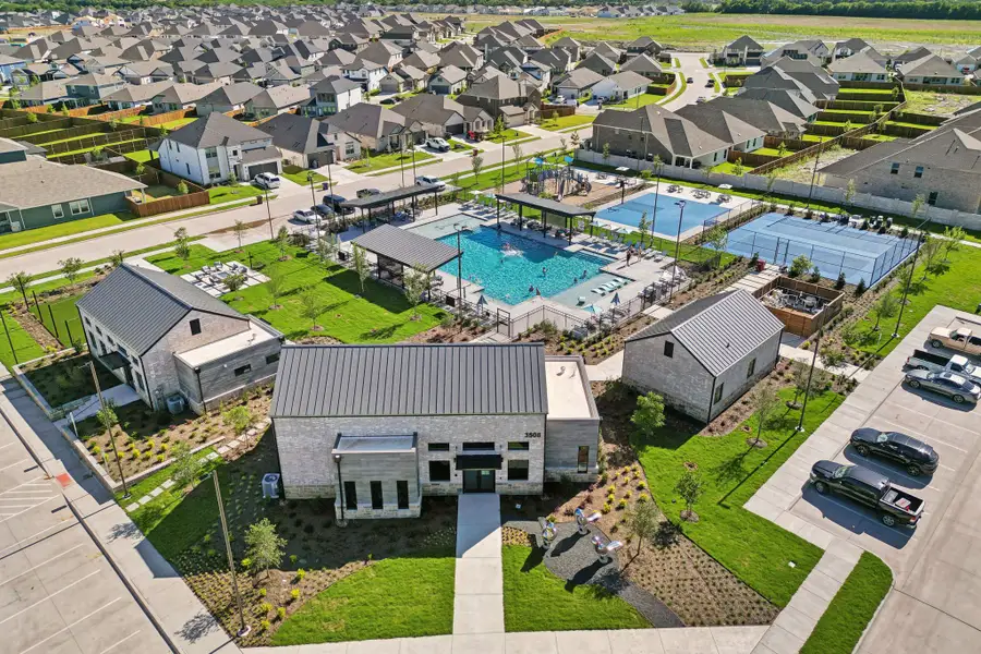 Aerial view of the Lakehaven - Spring Series community in Farmersville, TX, showing layout and nearby surroundings (Image 1). Aerial view of the Lakehaven - Spring Series community in Farmersville, TX, showing layout and nearby surroundings (Image 1).