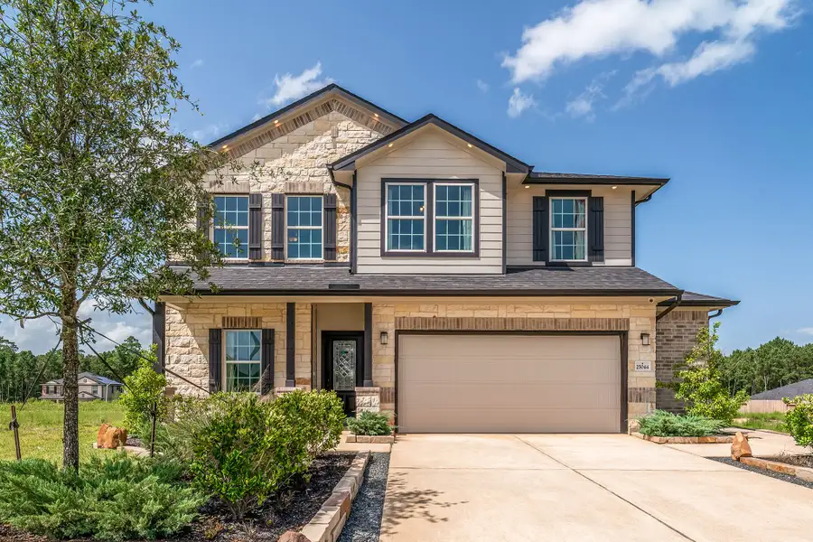 Front exterior of a home in the Magnolia Springs community, located in Montgomery, TX (Image 3).