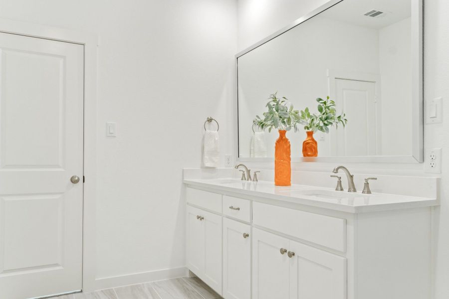 Furnished interior in a model home at Windsong Ranch Townhomes in Prosper (Image 31).