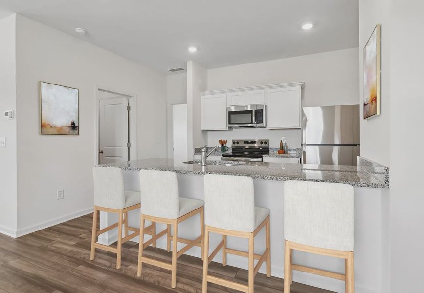 Furnished interior in a model home at Cottonwood Creek in San Marcos (Image 3).