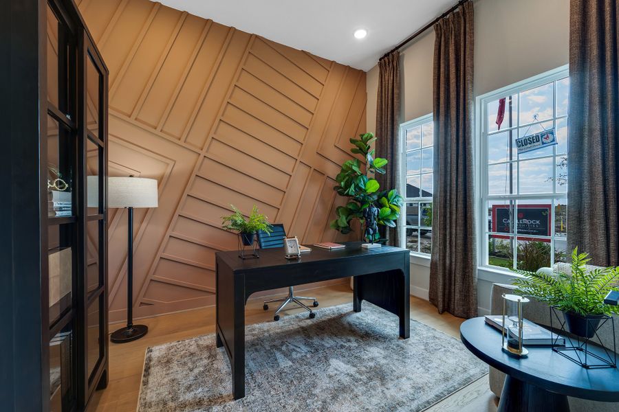 Furnished interior in a model home at Creekhaven in Iowa Colony (Image 3).