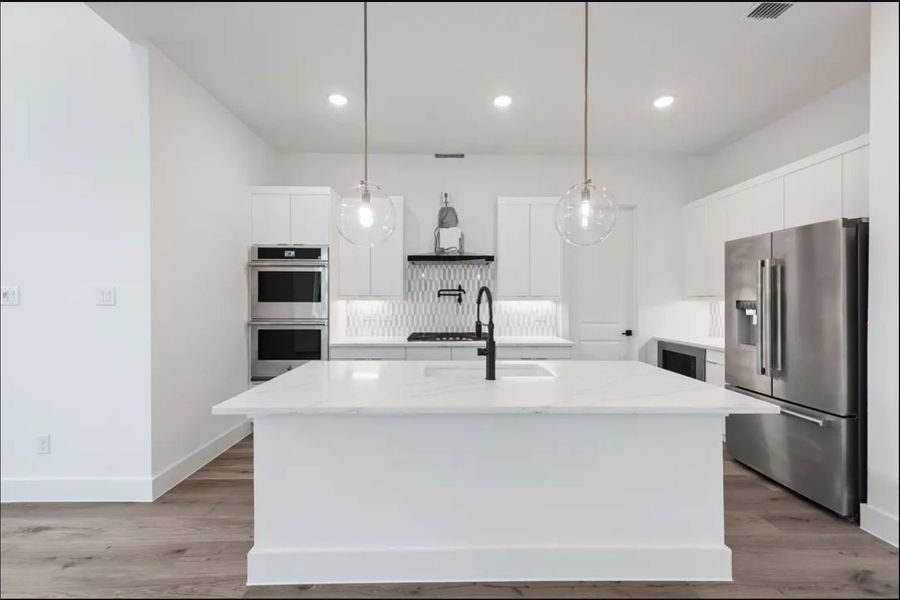 Furnished interior in a model home at Royal Court in Frisco (Image 14). Furnished interior in a model home at Royal Court in Frisco (Image 14).