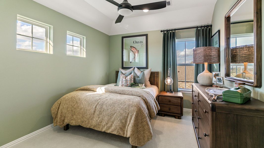 Furnished interior in a model home at Creekhaven in Iowa Colony (Image 29).