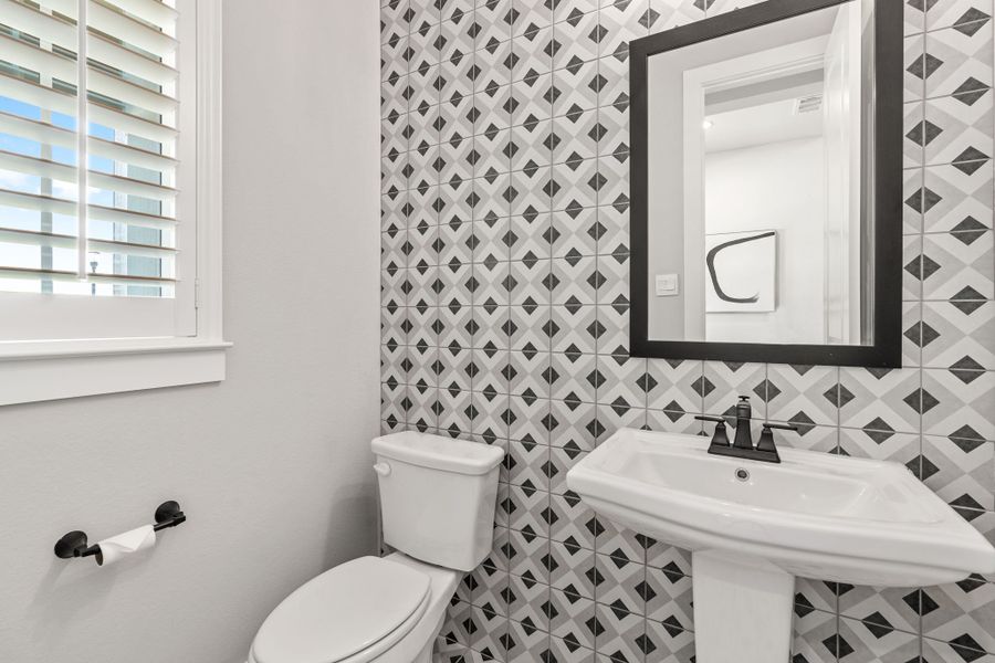 Plan 1406 Powder Bath - Mosaic 40s Model - Photo by American Legend Homes