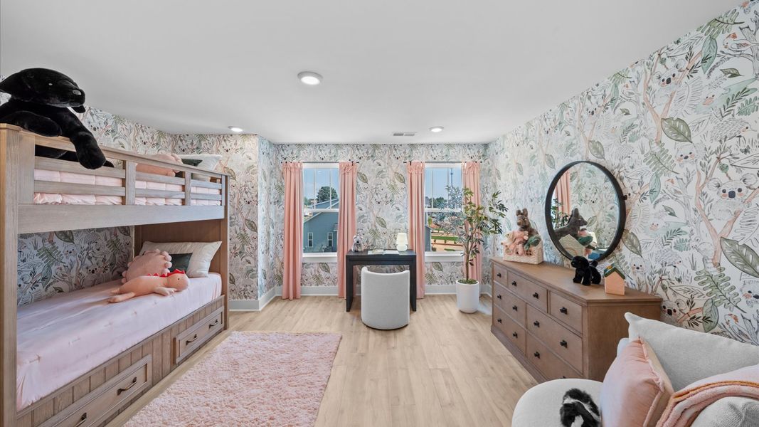 Functional secondary bedroom with hardwood flooring and modern touches in an exceptional layout at Robert's Farm