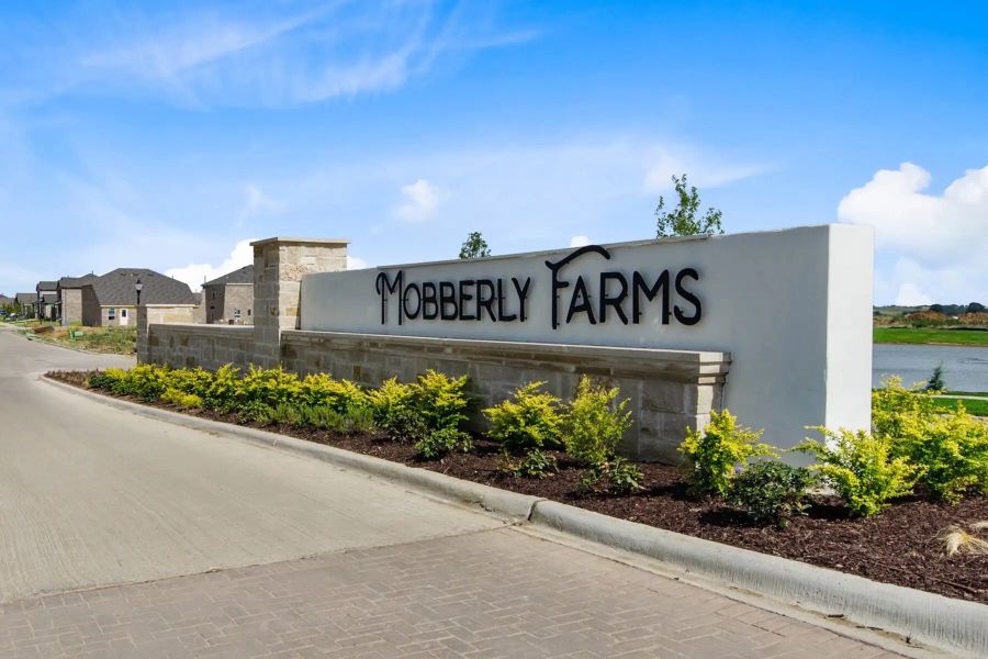 Main entrance to the Mobberly Farms master-planned community in Pilot Point, TX, featuring its landmark signage (Image 5).