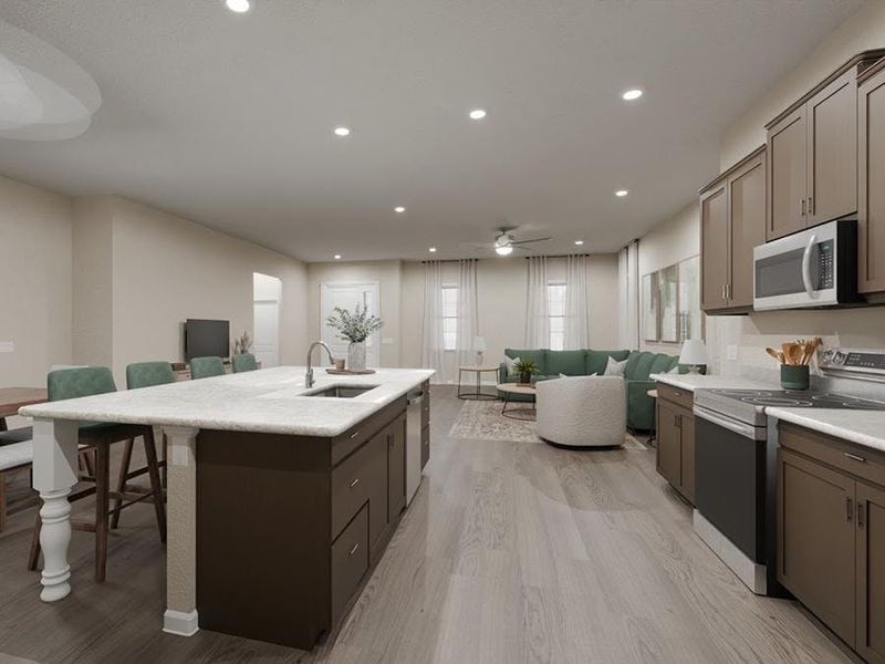 Your new kitchen is designed with a large island, quartz counters, and a walk-in pantry. (Artist`s rendering of the Lavender by Highland Homes)