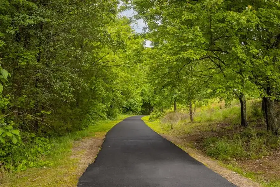 Start your day with a run or unwind with an evening walk along Sugar Creek Greenway. Start your day with a run or unwind with an evening walk along Sugar Creek Greenway.