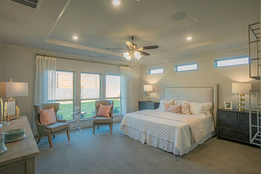 Furnished interior in a model home at Woodcreek in Fate (Image 17).