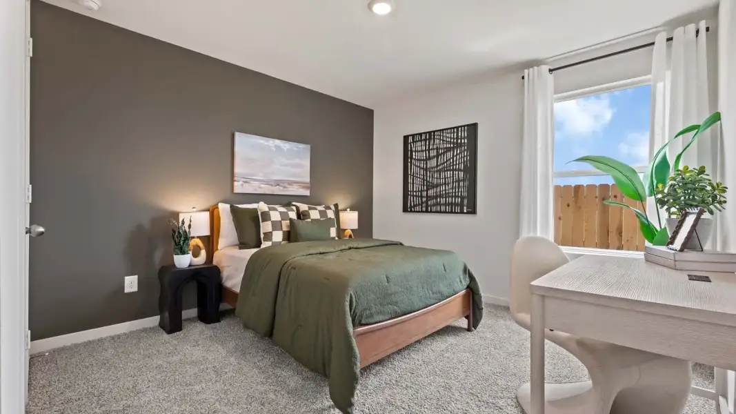 Furnished interior in a model home at Harvest Pointe in Needville (Image 11).