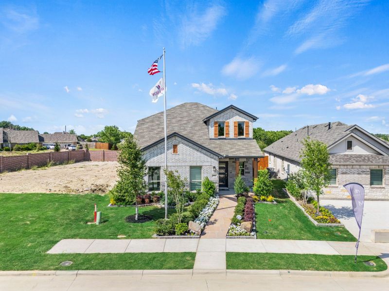 Front exterior of a home in the ValleyBrooke community, located in Mesquite, TX (Image 2).
