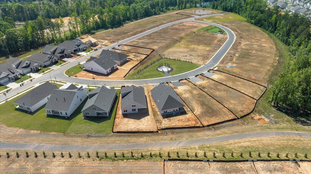 Aerial view of the The Villas at Galvins Ridge community in Sanford, NC, showing layout and nearby surroundings (Image 1). Aerial view of the The Villas at Galvins Ridge community in Sanford, NC, showing layout and nearby surroundings (Image 1).