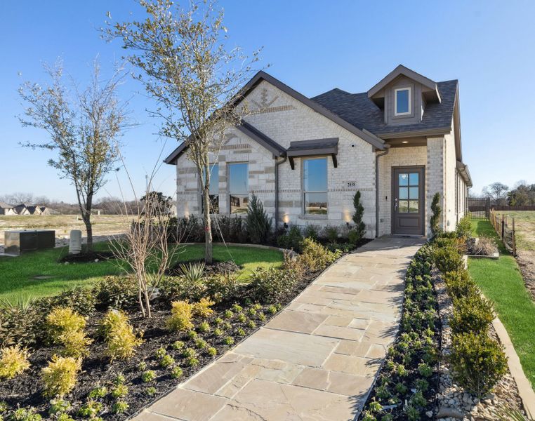Front exterior of a home in the Redden Farms – Active Adult community, located in Midlothian, TX (Image 2). Front exterior of a home in the Redden Farms – Active Adult community, located in Midlothian, TX (Image 2).
