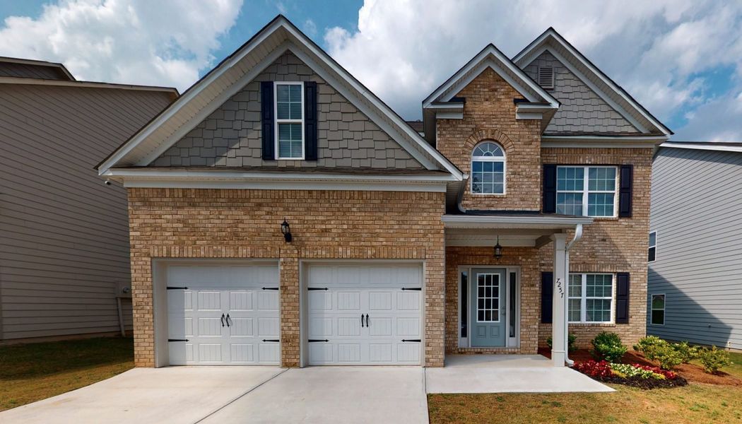 Front exterior of a home in the North Village community, located in Rydal, GA (Image 11).